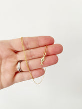 Load image into Gallery viewer, Against the Tide fish pendant necklace
