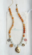 Load image into Gallery viewer, Harvest Bloom// oval locket // colorful gem and glass necklace
