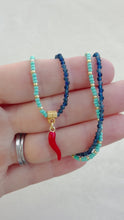 Load and play video in Gallery viewer, Napoli // red Italian horn pendant beaded glass and gemstone necklace
